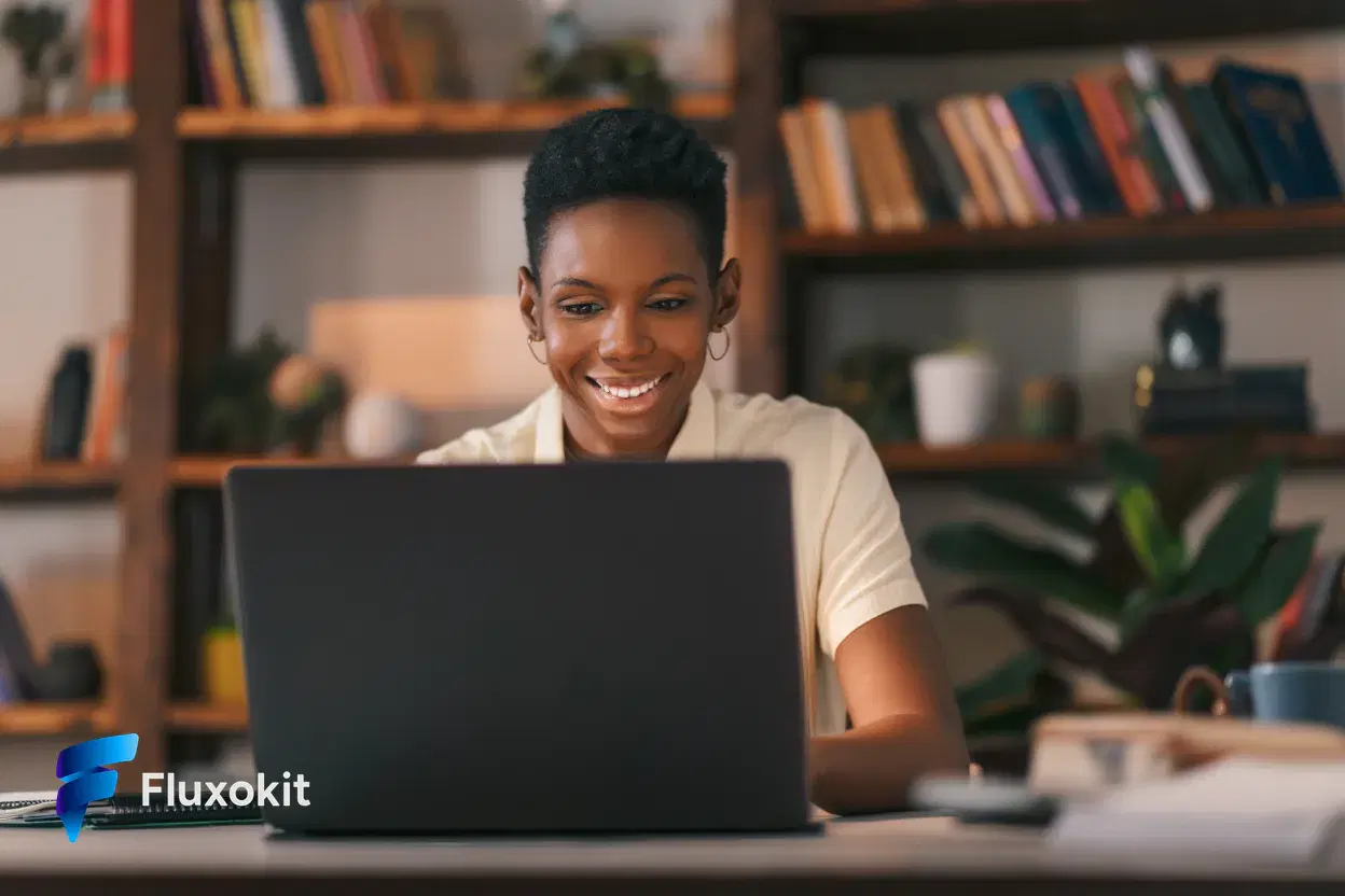 Real Reve Remix generation: A friendly educator smiling at a laptop in a warm home office, soft bokeh bookshelf, appro