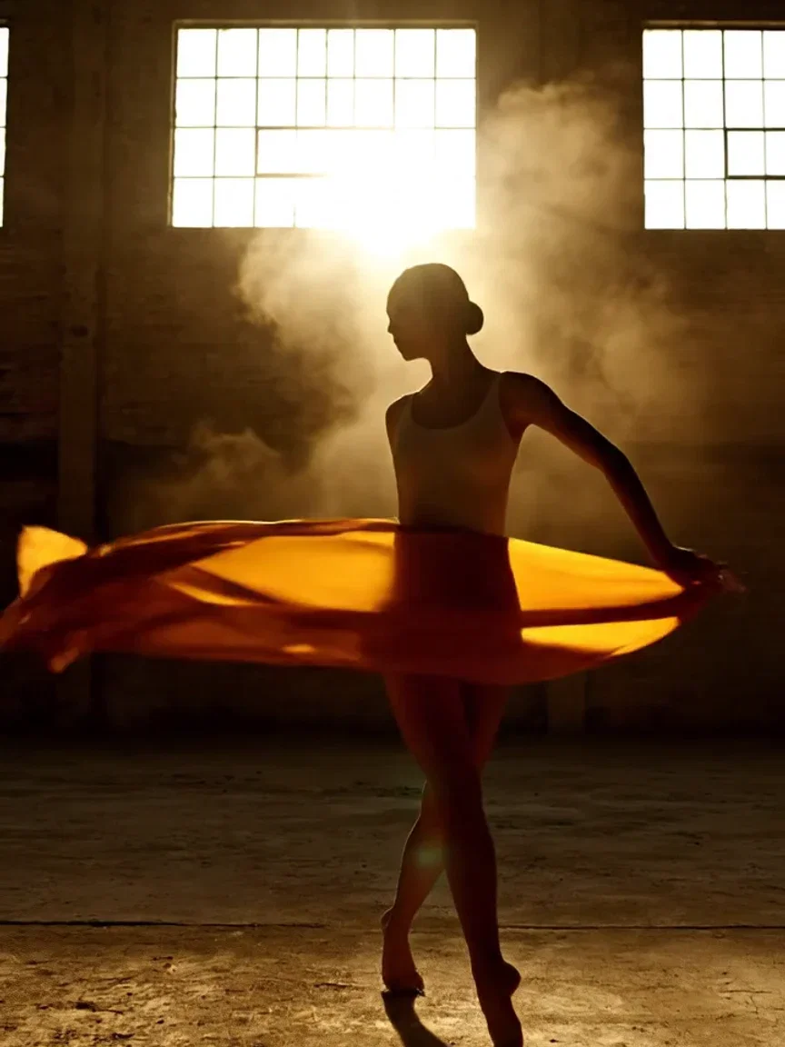 Amber silk flowing mid-spin, beat frame from a Veo 3.1 clip on FluxoKit